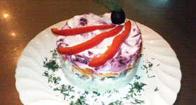 外套を着たニシン