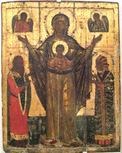 聖母を挟んだ聖ダウマンタスとその妻マリア